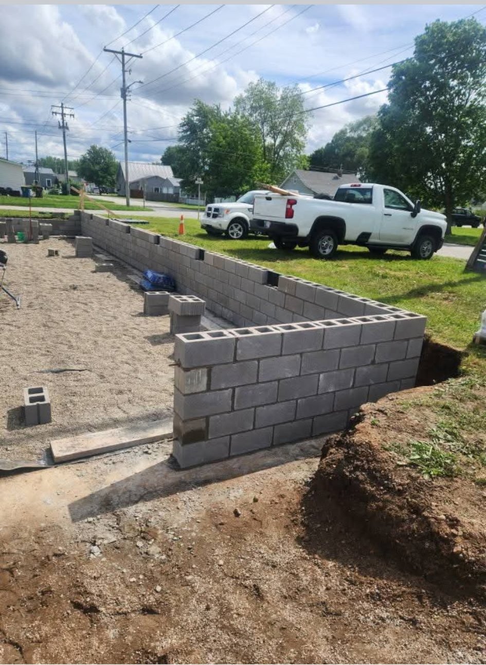Five-course cement block crawl space foundation built by Adams Masonry
